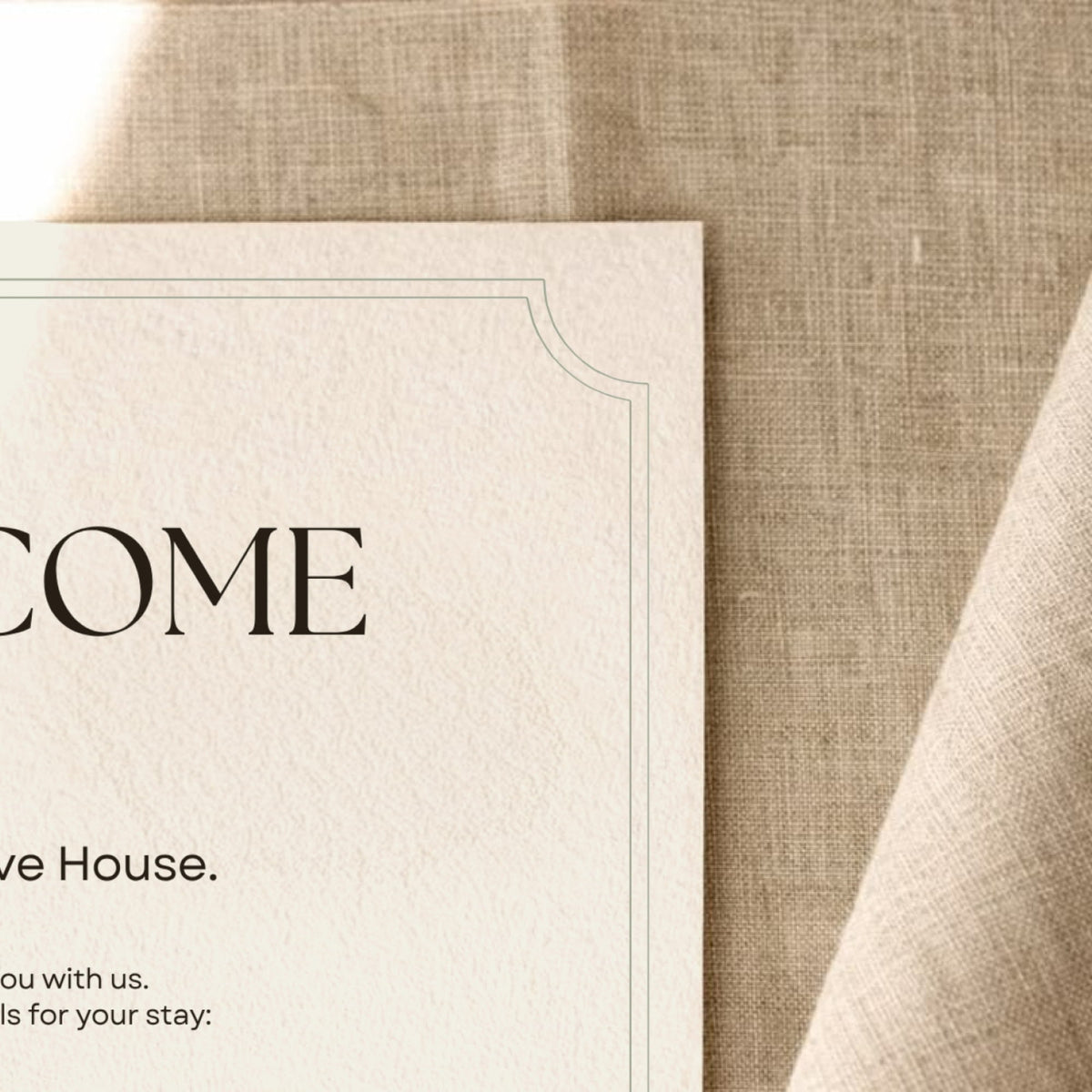 Boutique hotel welcome sign displayed in a reception area.